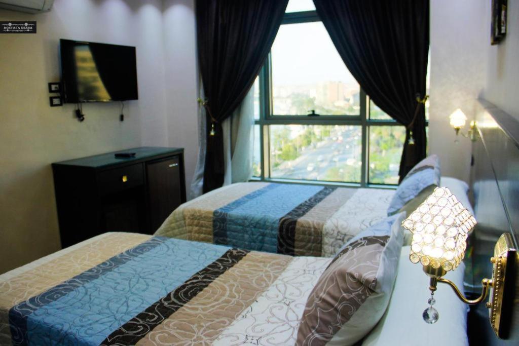 Aswan Plaza - Share Apartment Eksteriør billede